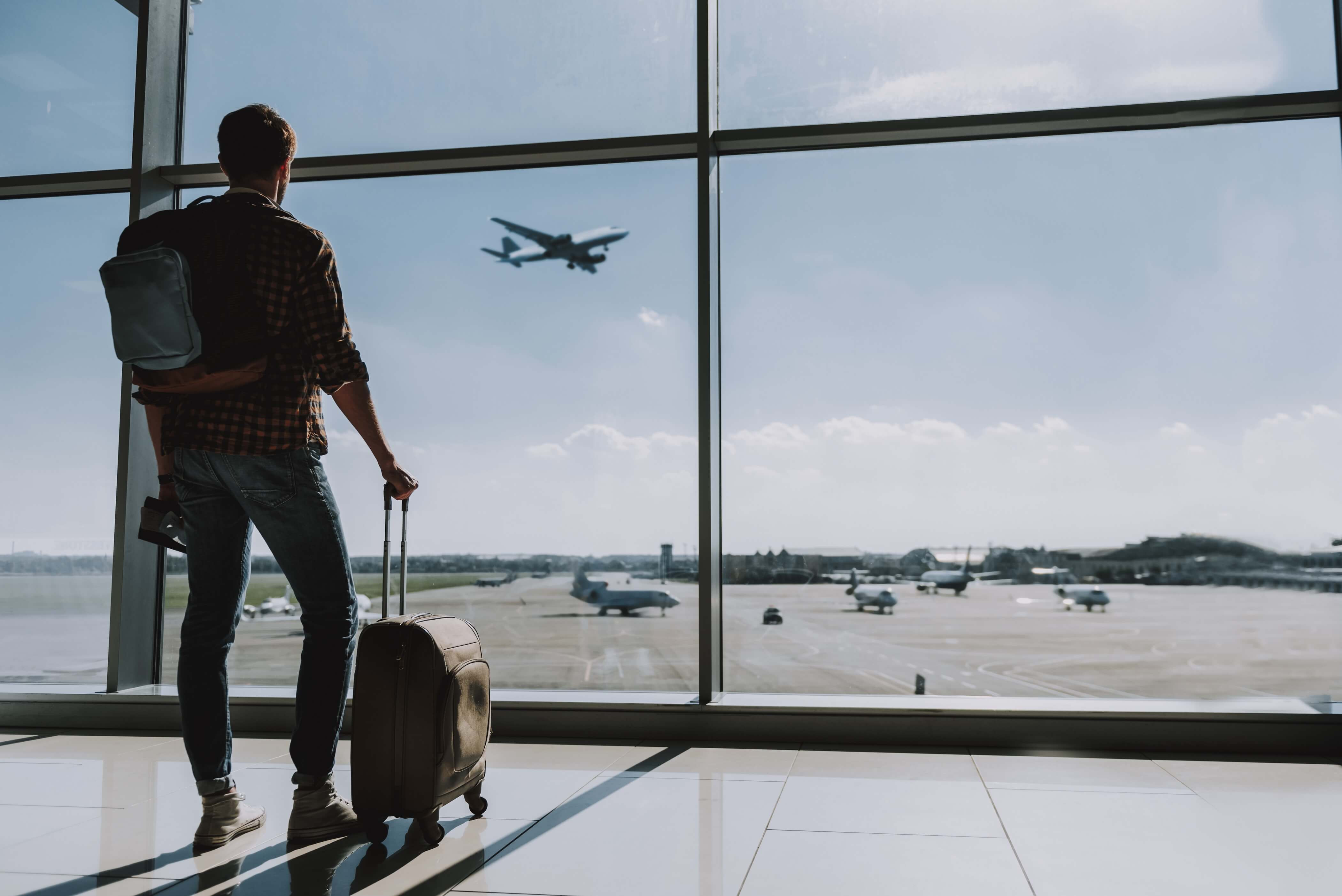 man about to board plane flight
