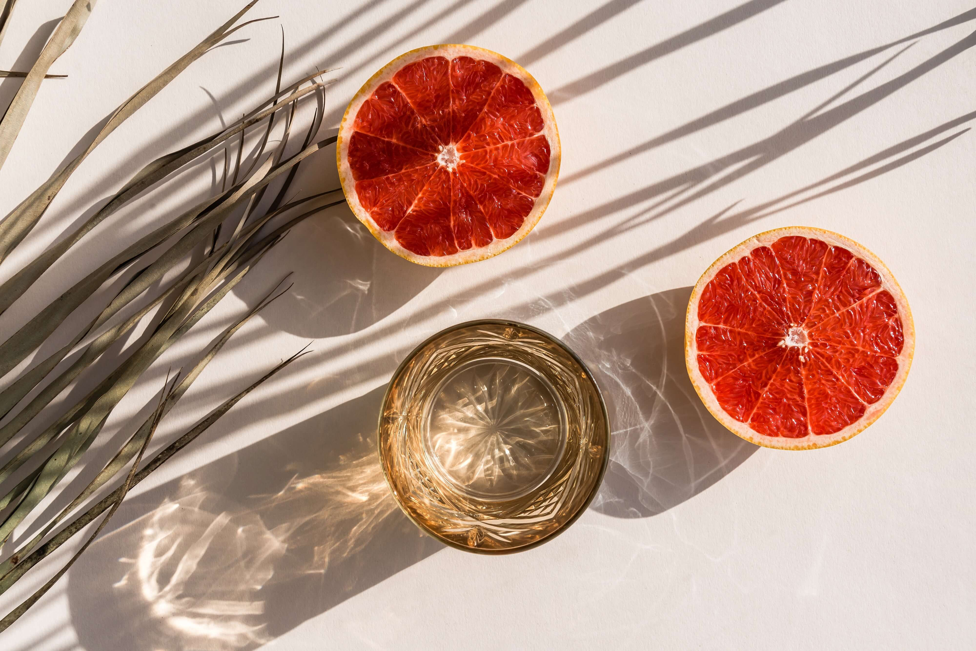 grapefruit slices and glass