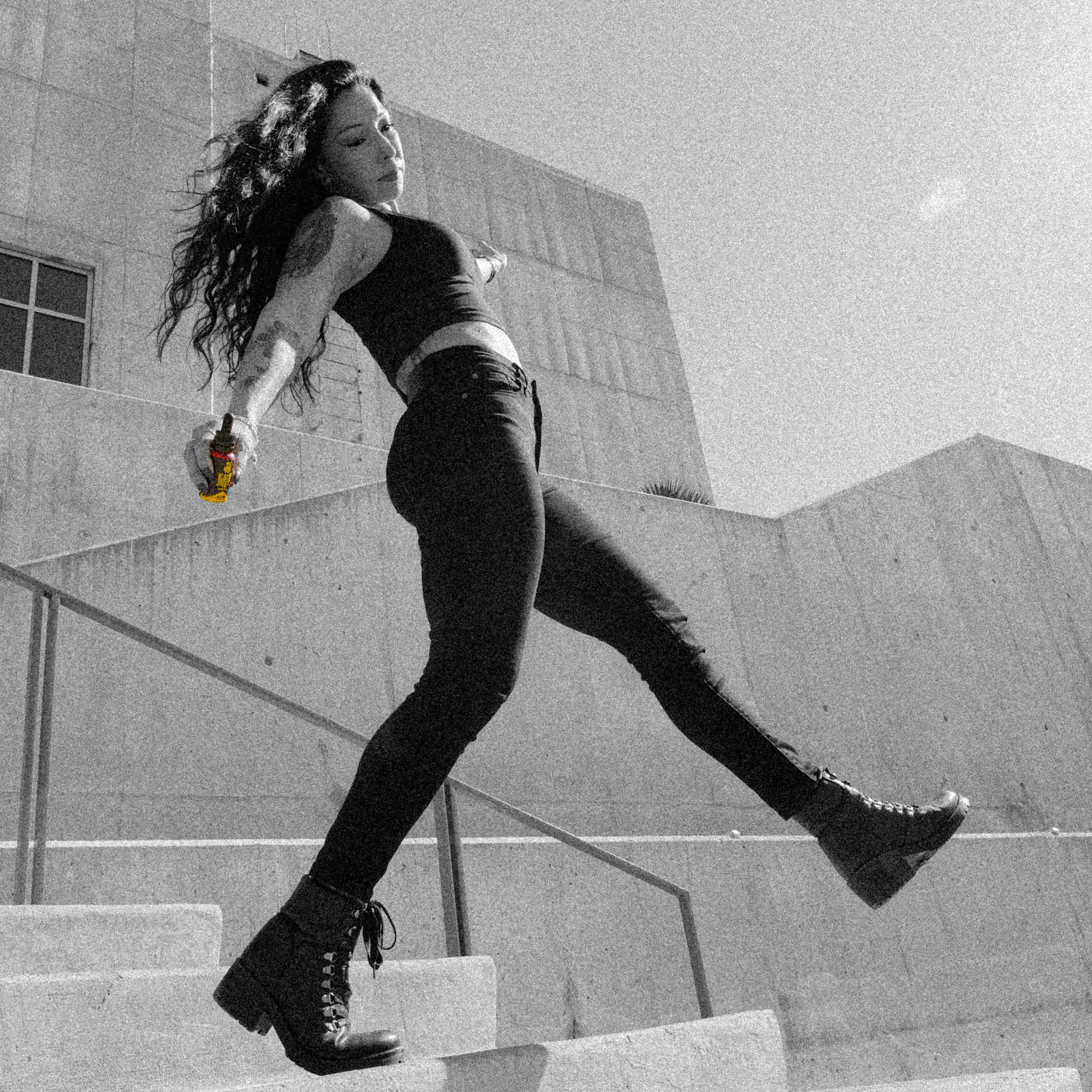 woman holding kratom tincture